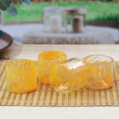 Blown recycled glass juice glasses, 'Marigold Relaxation' (set of 4) - 4 Hand Blown Orange Recycled Glass Juice Glasses from Mexico