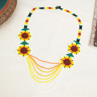 Beaded waterfall necklace, 'Eye-Catching Flowers' - Floral-Themed Waterfall Beaded Huichol Necklace with Strands