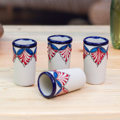 Ceramic tequila cups, 'Hidalgo Flourish' (Set of 4) - Set of 4 Handmade Talavera-Style Blue and Red Tequila Cups