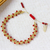 Crystal beaded bracelet, 'Passionate Golden' - Adjustable Golden-Toned Red Crystal Beaded Bracelet