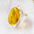 Amber cocktail ring, 'Gleaming Glam' - Sterling Silver Adjustable Cocktail Ring with Oval Amber (image 2b) thumbail