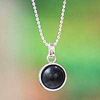 Sterling silver and ceramic pendant necklace, 'Enigmatic Sun' - Modern Sterling Silver and Barro Negro Pendant Necklace