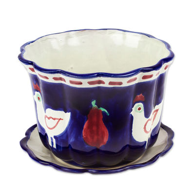 Maceta y platillo de cerámica. - Maceta y platillo de cerámica azul con temática de paloma y frutas.
