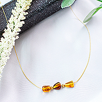 Gold-plated amber pendant necklace, 'Amber Essence' - 14k Gold-Plated Natural Amber Pendant Necklace from Mexico