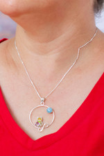 Natural flower and sterling silver pendant necklace, 'Lunar Feline' - Moon and Cat-Themed Natural Flower Round Pendant Necklace