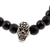 Men's onyx beaded stretch pendant bracelet, 'Enchanted Skull' - Men's Onyx Stretch Bracelet with Taxco Silver Skull Pendant