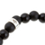 Men's onyx beaded stretch pendant bracelet, 'Enchanted Skull' - Men's Onyx Stretch Bracelet with Taxco Silver Skull Pendant