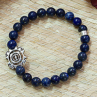 Men's tiger's eye beaded stretch pendant bracelet, 'Blue Sublime Sun' - Men's Tiger's Eye Stretch Bracelet with Silver Sun Pendant