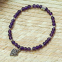 Amethyst beaded stretch charm bracelet, 'Purple Agave Love' - Amethyst Stretch Bracelet with Taxco Silver Heart Charm