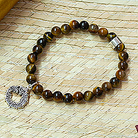 Men's tiger's eye beaded stretch charm bracelet, 'Mighty Quetzalcoatl' - Men's Tiger's Eye Silver Quetzalcoatl Stretch Charm Bracelet