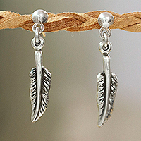 Sterling silver dangle earrings, 'Feather Dance' - Artisan-Made Feather-Shaped Sterling Silver Dangle Earrings