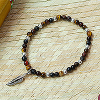 Tiger's eye beaded stretch charm bracelet, 'Feather Flair' - Tiger's Eye Stretch Bracelet with Taxco Silver Feather Charm