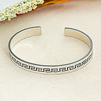 Sterling silver cuff bracelet, 'Aztec Charm' - Taxco Silver Cuff Bracelet with Aztec-Inspired Motifs