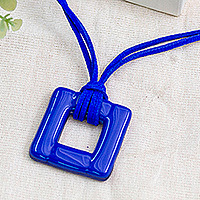 Art glass pendant necklace, 'Lapis Square' - Fused Art Glass Blue Square Pendant Necklace with Suede Cord