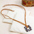 Art glass pendant necklace, 'Animal Print Square' - Animal Print-Themed Fused Art Glass Square Pendant Necklace