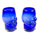Handblown recycled glass tumblers, 'Blue Mexican Skull' (pair) - Two Blue Skull-Themed Handblown Recycled Glass Tumblers
