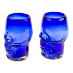 Handblown recycled glass tumblers, 'Blue Mexican Skull' (pair) - Two Blue Skull-Themed Handblown Recycled Glass Tumblers