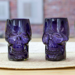 Handblown recycled glass tumblers, 'Purple Mexican Skull' (pair) - 2 Purple Handblown Recycled Glass Tumblers with Skull Motif
