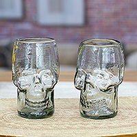 Handblown recycled glass tumblers, 'Mexican Skull' (pair) - Pair of Handblown Recycled Glass Tumblers with Skull Motif