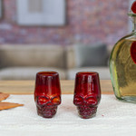 Handblown recycled glass tequila glasses, 'Red Mexican Skull' (pair) - 2 Red Skull-Themed Handblown Recycled Glass Tequila Glasses