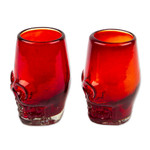 Handblown recycled glass tequila glasses, 'Red Mexican Skull' (pair) - 2 Red Skull-Themed Handblown Recycled Glass Tequila Glasses