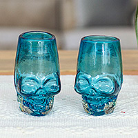 Handblown recycled glass tequila glasses, 'Aqua Mexican Skull' (pair) - 2 Aqua-Hued Handblown Recycled Glass Skull Tequila Glasses