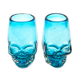 Handblown recycled glass tequila glasses, 'Aqua Mexican Skull' (pair) - 2 Aqua-Hued Handblown Recycled Glass Skull Tequila Glasses