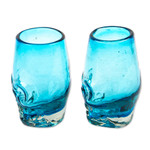 Handblown recycled glass tequila glasses, 'Aqua Mexican Skull' (pair) - 2 Aqua-Hued Handblown Recycled Glass Skull Tequila Glasses