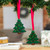 Wood ornaments, 'Evergreen Christmas' (pair) - Nature-Themed Christmas Tree-Shaped Green Wood Ornament Pair