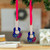 Wood ornaments, 'Little Tunes' (pair) - Music-Themed Pair of Hand-Painted Blue Wood Guitar Ornaments