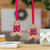 Wood ornaments, 'Ginger Love' (pair) - Pair of Gingerbread Man-Shaped Hand-Painted Wood Ornaments