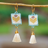 Gold-accented glass beaded dangle earrings, 'Celestial Hearts' - Gold-Accented Glass Bead Dangle Earrings with Ivory Tassels