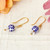 Gold-accented ceramic dangle earrings, 'Talavera Sparks' - Artisan-Made Talavera-Themed Gold-Accented Dangle Earrings