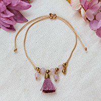 Rose quartz and silk tassel bracelet, 'Tassel of Compassion' - Pink Silk and Rose Quartz Tassel Bracelet Crafted in Mexico