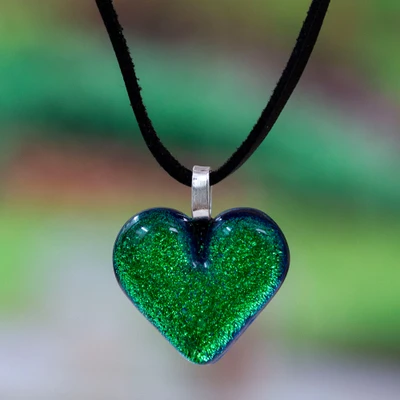 Art glass pendant necklace, 'Heartfelt Hope' - Heart-Themed Green Art Glass and Faux Suede Pendant Necklace