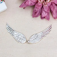 Sterling silver pendant, 'Guardian Wings' - Modern Textured Taxco Silver Pendant with Angel Wings Motif