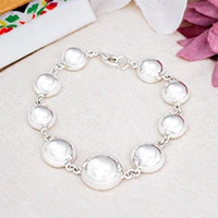 Sterling silver pendant bracelet, 'Shimmering Baubles' - Modern Bauble-Themed Polished Taxco Silver Pendant Bracelet