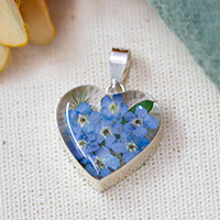 Natural flower resin pendant, 'Unforgettable Hearts' - Heart-Shaped Natural Forget-Me-Not Flower and Resin Pendant