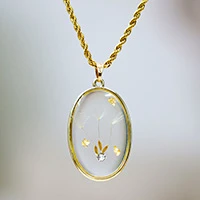 Gold-plated natural flower pendant necklace, 'Ethereal Hope' - Dandelion-Themed 24k Gold-Plated Resin Pendant Necklace