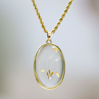 Gold-plated natural flower pendant necklace, 'Ethereal Hope' - Dandelion-Themed 24k Gold-Plated Resin Pendant Necklace