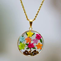 Gold-accented natural flower and resin pendant necklace, 'My Season' - Colorful 24k Gold-Accented Natural Flower Pendant Necklace