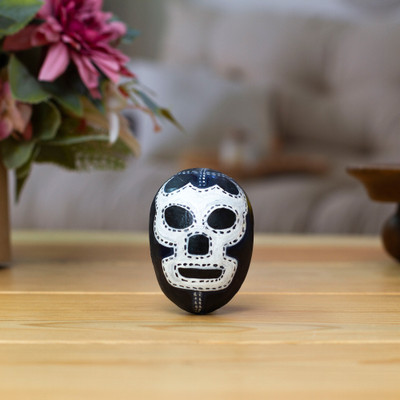 Recycled paper figurine, 'The Blue Demon' - Mexican-Made White and Dark Blue Hand-Painted Mask Figurine