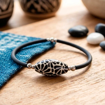 Ceramic pendant bracelet, 'Black Feather Talavera' - Talavera Style Ceramic Pendant Bracelet with Painted Motifs
