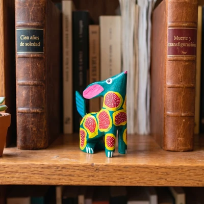 Wood alebrije figurine, 'Curious Coyote' - Coyote-Shaped Alebrije Figurine Hand-Carved from Copal Wood