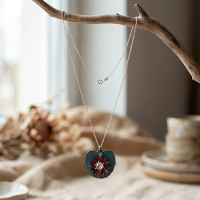 Titanium and sterling silver pendant necklace, 'Dazzling Water Lily' - Water Lily-Inspired Modern Titanium Silver Pendant Necklace