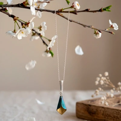 Titanium and sterling silver pendant necklace, 'Calla Lily Glam' - Minimalist Calla Lily Titanium and Silver Pendant Necklace