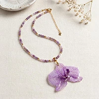 Gold-accented natural flower, amethyst and rose quartz beaded statement necklace, 'Regal Orchid' - Gold-Accented Preserved Orchid Amethyst Rose Quartz Necklace