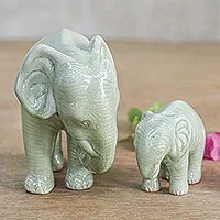 Celadon ceramic statuettes, 'Natural Nurture' (pair) - Green Celadon Ceramic Elephant Statuettes (Pair)