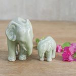 Celadon ceramic statuettes, 'Natural Nurture' (pair) - Green Celadon Ceramic Elephant Statuettes (Pair)