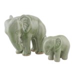 Celadon ceramic statuettes, 'Natural Nurture' (pair) - Green Celadon Ceramic Elephant Statuettes (Pair)